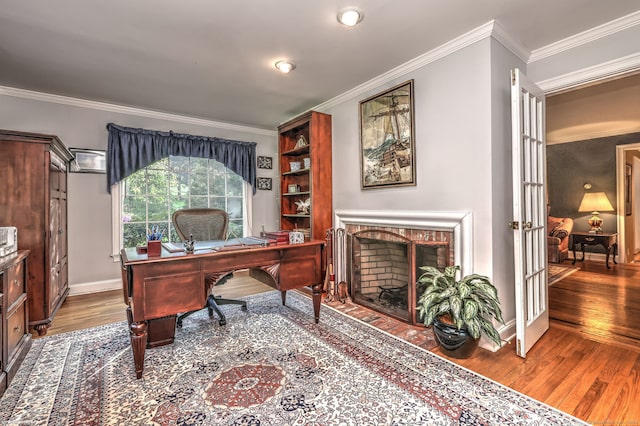 16 Black Rock Tpke, Redding, CT 06896 - office area with wood finished floors, crown molding, a brick fireplace, and baseboards