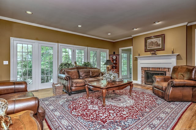 16 Black Rock Tpke, Redding, CT 06896 - living room featuring light wood-style flooring, a brick fireplace, ornamental molding, and recessed lighting