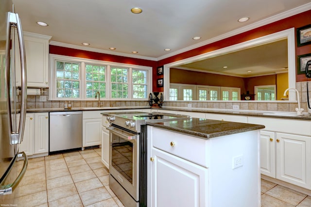 16 Black Rock Tpke, Redding, CT 06896 - kitchen featuring appliances with stainless steel finishes, a sink, light tile patterned floors, healthy amount of natural light, and recessed lighting