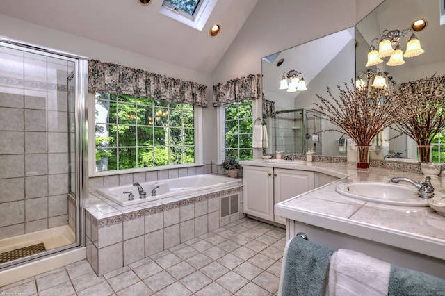 16 Black Rock Tpke, Redding, CT 06896 - full bath with tile patterned flooring, a shower stall, a skylight, a bath, and lofted ceiling