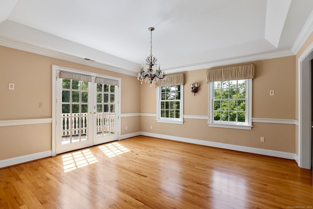 2 Governors Row Unit 2, West Hartford, CT 06117 - empty room featuring a chandelier, wood finished floors, baseboards, and crown molding
