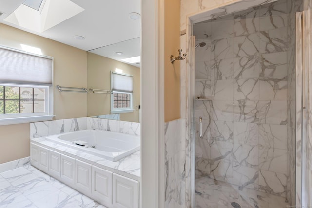 2 Governors Row Unit 2, West Hartford, CT 06117 - full bath featuring a marble finish shower, a skylight, a bath, and marble look tile flooring