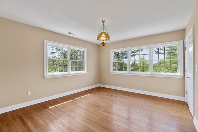 2 Governors Row Unit 2, West Hartford, CT 06117 - empty room with baseboards and light wood finished floors