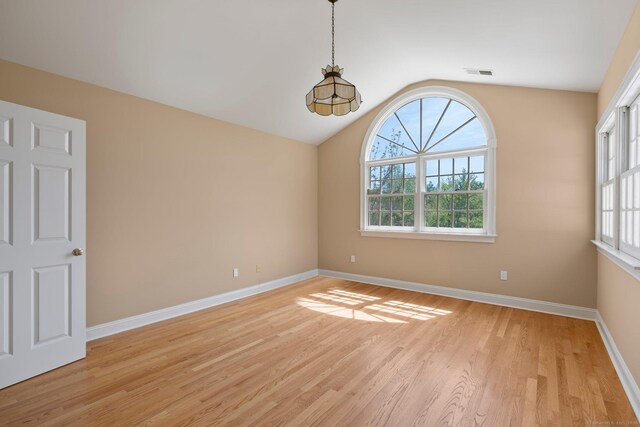 2 Governors Row Unit 2, West Hartford, CT 06117 - empty room with plenty of natural light, light wood-style floors, baseboards, and lofted ceiling