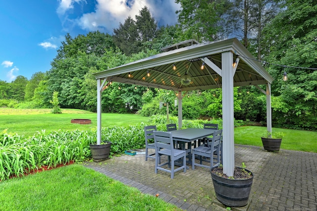 691 Buttonball Rd, Orange, CT 06477 - view of patio with a gazebo, outdoor dining space, and view of wooded area