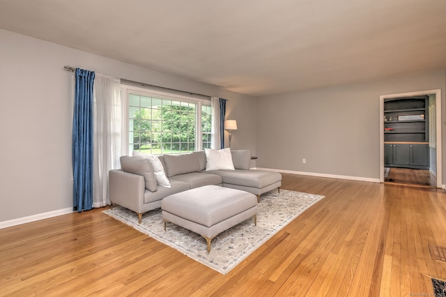 691 Buttonball Rd, Orange, CT 06477 - living area featuring light wood finished floors and baseboards