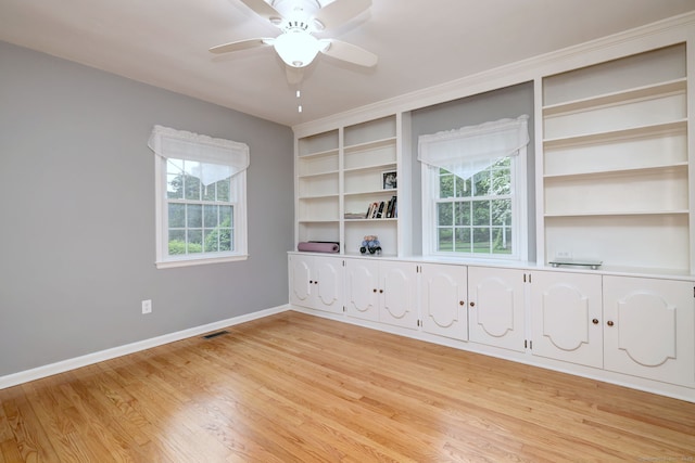 691 Buttonball Rd, Orange, CT 06477 - spare room featuring baseboards, light wood-style flooring, and ceiling fan