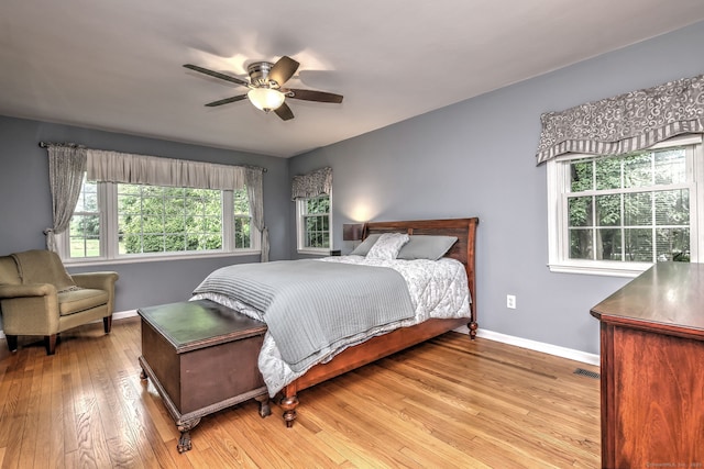 691 Buttonball Rd, Orange, CT 06477 - bedroom featuring baseboards, wood-type flooring, and a ceiling fan