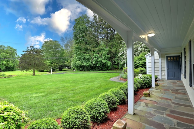 691 Buttonball Rd, Orange, CT 06477 - view of grassy yard featuring view of wooded area