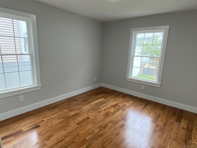 285 Alba Ave, Bridgeport, CT 06606 - unfurnished room with baseboards and wood finished floors