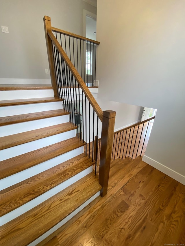 285 Alba Ave, Bridgeport, CT 06606 - staircase featuring wood finished floors and baseboards