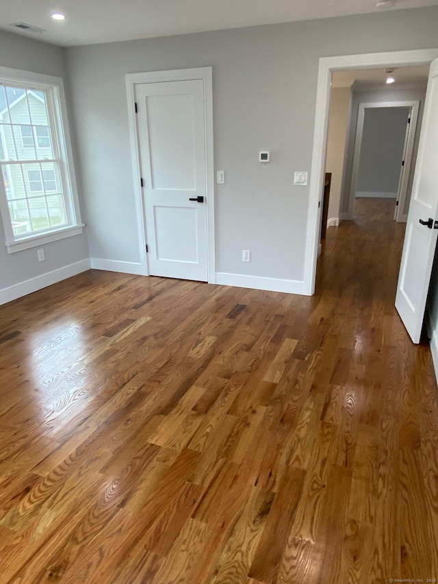 285 Alba Ave, Bridgeport, CT 06606 - spare room with baseboards and wood finished floors