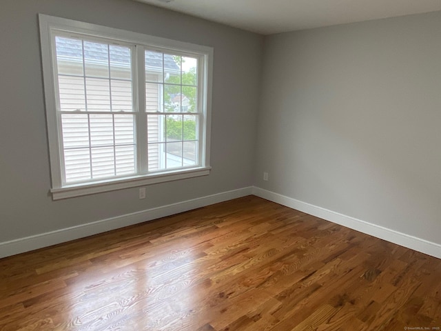 285 Alba Ave, Bridgeport, CT 06606 - empty room with wood finished floors