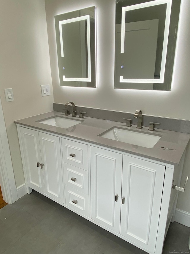 285 Alba Ave, Bridgeport, CT 06606 - full bathroom featuring double vanity and tile patterned floors