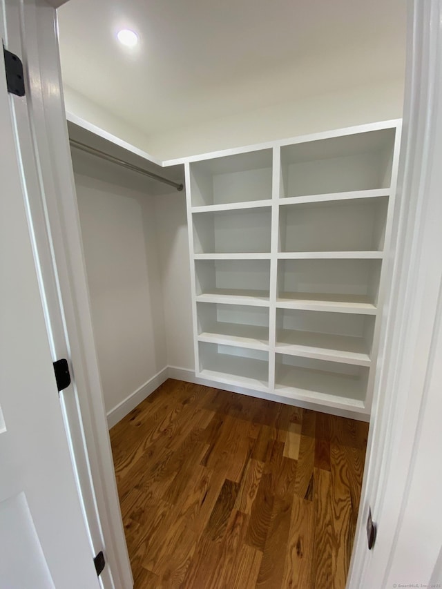 285 Alba Ave, Bridgeport, CT 06606 - walk in closet with dark wood-style flooring