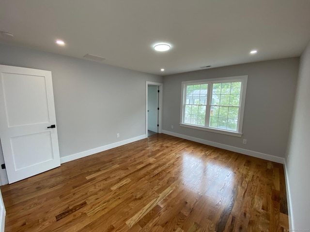 285 Alba Ave, Bridgeport, CT 06606 - spare room with wood finished floors and recessed lighting