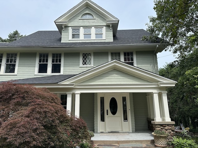 1666 Ridge Rd, North Haven, CT 06473 - view of front of house with covered porch and roof with shingles