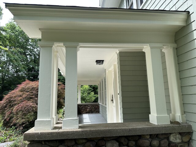 1666 Ridge Rd, North Haven, CT 06473 - view of exterior entry with covered porch