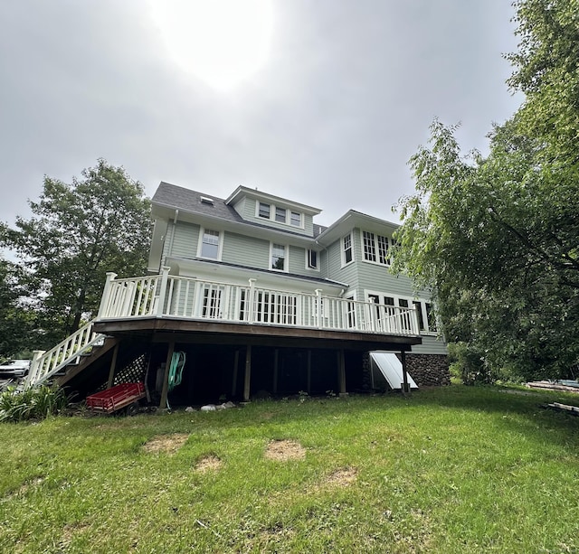 1666 Ridge Rd, North Haven, CT 06473 - back of property featuring a lawn, a wooden deck, and stairs