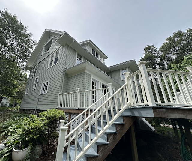 1666 Ridge Rd, North Haven, CT 06473 - view of home's exterior featuring stairs and a wooden deck