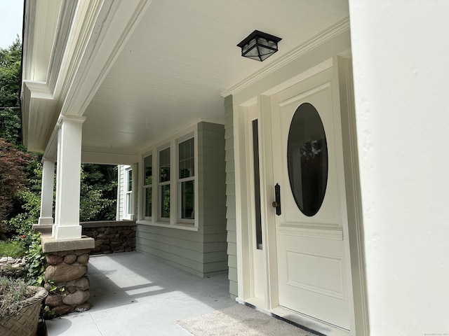 1666 Ridge Rd, North Haven, CT 06473 - doorway to property featuring covered porch
