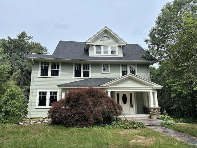 1666 Ridge Rd, North Haven, CT 06473 - view of front facade with covered porch and roof with shingles