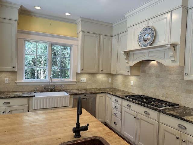 1666 Ridge Rd, North Haven, CT 06473 - kitchen featuring stainless steel gas stovetop, wood counters, dishwasher, decorative backsplash, and crown molding