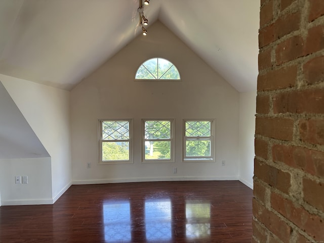 1666 Ridge Rd, North Haven, CT 06473 - unfurnished living room with vaulted ceiling and wood-type flooring