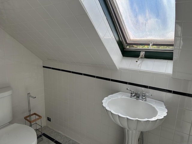 1666 Ridge Rd, North Haven, CT 06473 - bathroom featuring tile walls and toilet