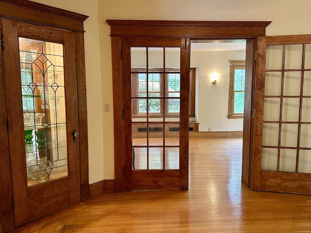 1666 Ridge Rd, North Haven, CT 06473 - doorway featuring wood finished floors and french doors