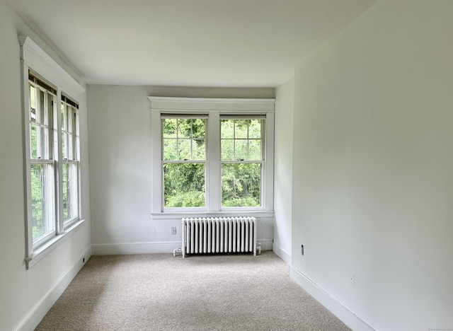 1666 Ridge Rd, North Haven, CT 06473 - spare room with radiator heating unit and carpet