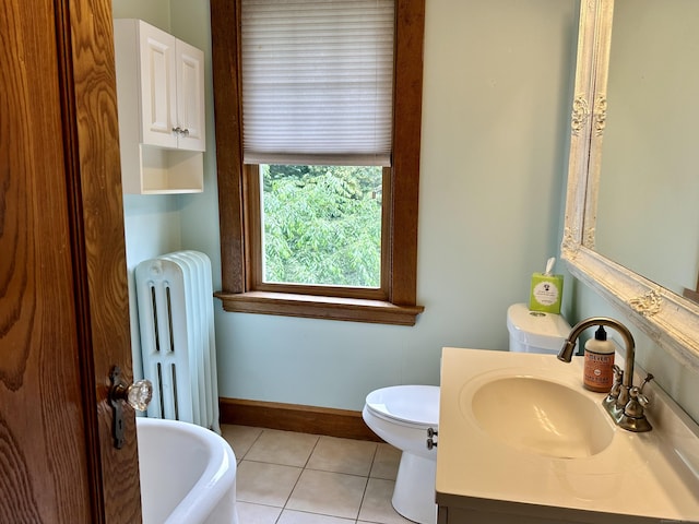1666 Ridge Rd, North Haven, CT 06473 - full bath featuring radiator, a freestanding tub, tile patterned floors, and vanity
