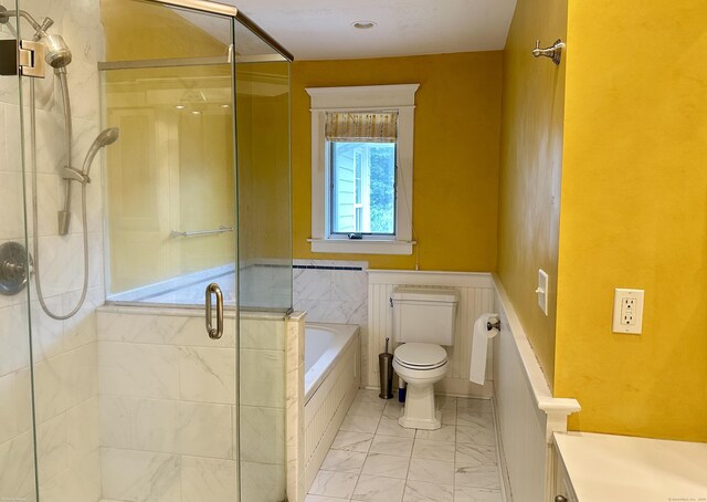 1666 Ridge Rd, North Haven, CT 06473 - full bathroom featuring a bath, marble look tile flooring, and a shower stall