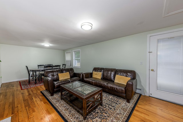 92 Blakeslee Ave, North Haven, CT 06473 - living room with wood finished floors and a baseboard radiator