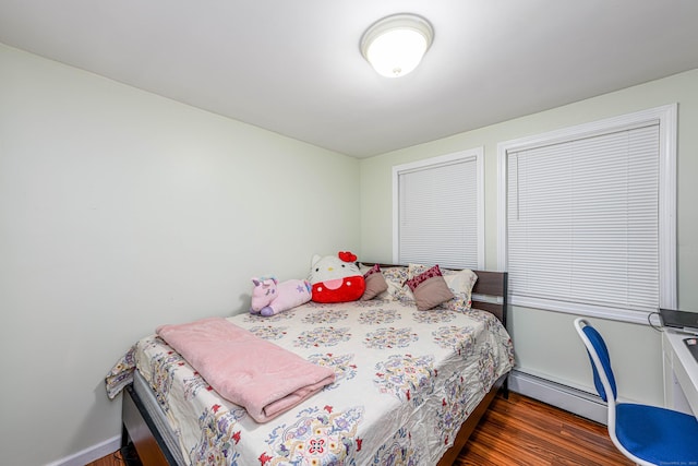 92 Blakeslee Ave, North Haven, CT 06473 - bedroom with wood finished floors, baseboard heating, and baseboards