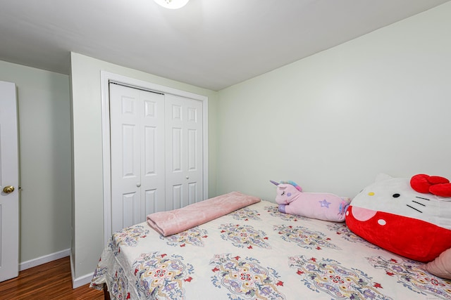 92 Blakeslee Ave, North Haven, CT 06473 - bedroom with wood finished floors, a closet, and baseboards