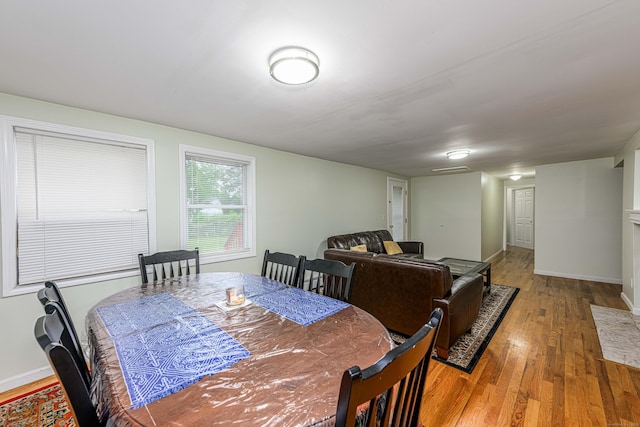 92 Blakeslee Ave, North Haven, CT 06473 - dining room with light wood-type flooring and baseboards