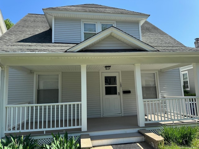 187 Jewett Ave, Bridgeport, CT 06606 - view of front of house with a porch and a shingled roof