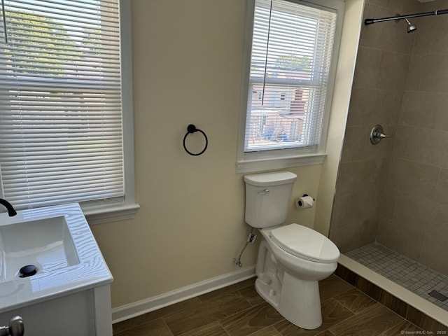 187 Jewett Ave, Bridgeport, CT 06606 - full bath featuring a sink, toilet, and a tile shower
