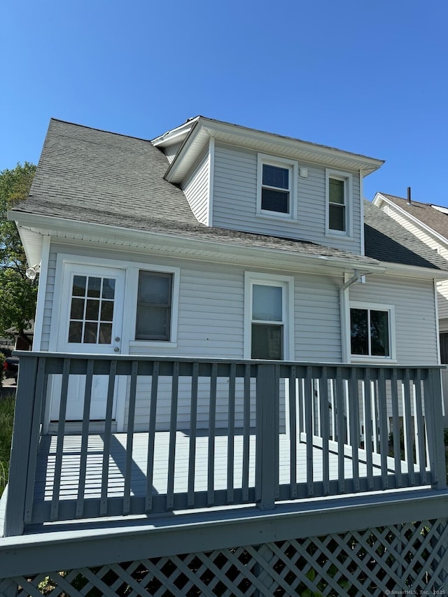 187 Jewett Ave, Bridgeport, CT 06606 - back of property with a deck and a shingled roof
