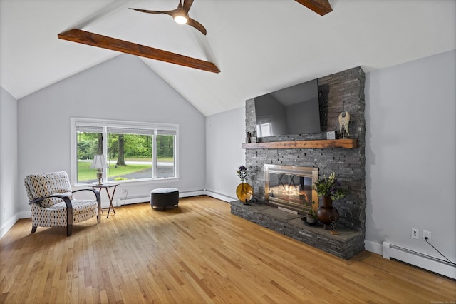 21 Corrina Ln, Salem, CT 06420 - living room with baseboard heating, hardwood / wood-style flooring, a stone fireplace, ceiling fan, and baseboards
