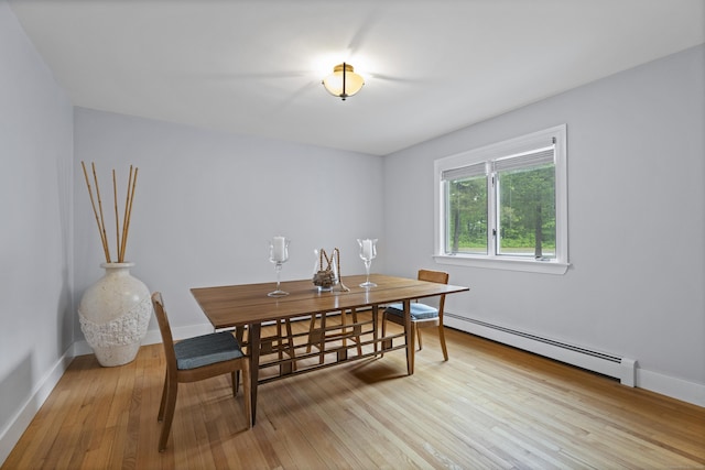 21 Corrina Ln, Salem, CT 06420 - dining room featuring a baseboard heating unit, light wood-type flooring, and baseboards