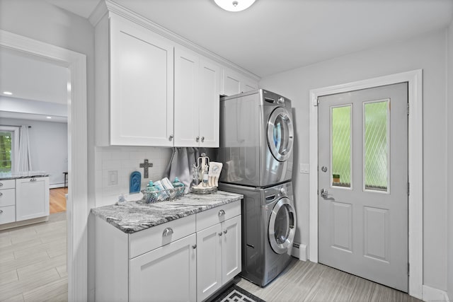 21 Corrina Ln, Salem, CT 06420 - washroom with estacked washer and dryer and cabinet space