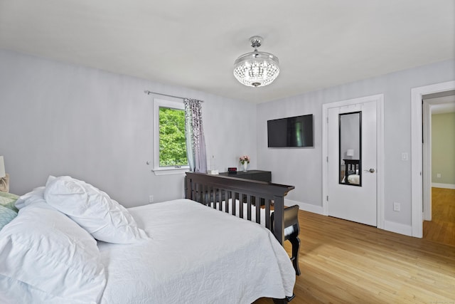 21 Corrina Ln, Salem, CT 06420 - bedroom featuring light wood-style floors, a chandelier, and baseboards