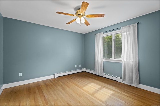 21 Corrina Ln, Salem, CT 06420 - spare room with ceiling fan, wood finished floors, a baseboard heating unit, and baseboards