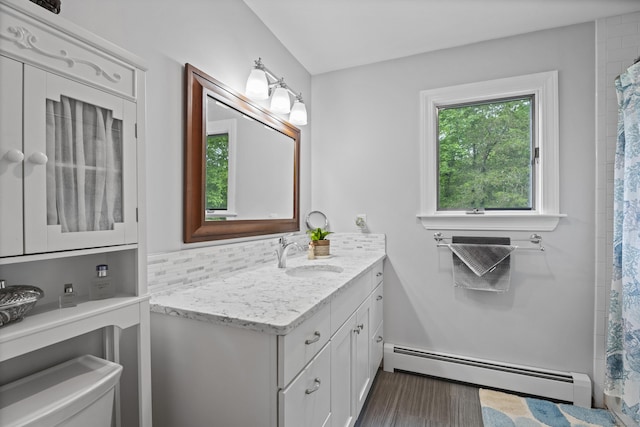 21 Corrina Ln, Salem, CT 06420 - full bath featuring a baseboard radiator, vanity, wood finished floors, and a shower with shower curtain