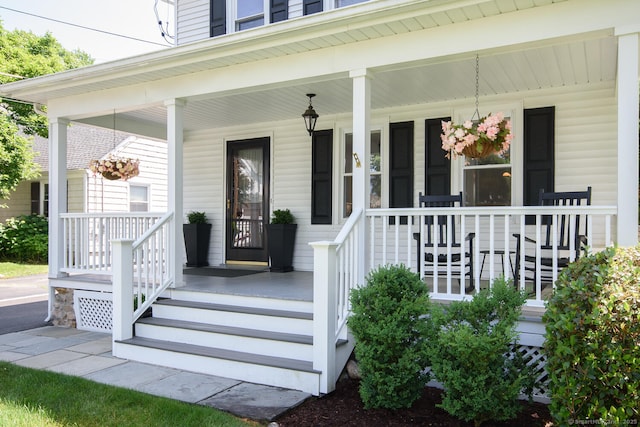 10 Fairfield Ave, Darien, CT 06820 - doorway to property featuring a porch