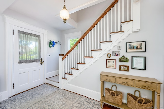 10 Fairfield Ave, Darien, CT 06820 - entryway with stairs, baseboards, and wood finished floors