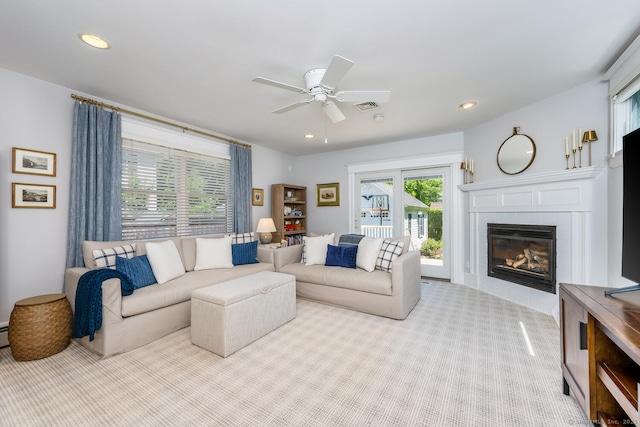 10 Fairfield Ave, Darien, CT 06820 - living room with a ceiling fan, a tile fireplace, carpet flooring, and recessed lighting