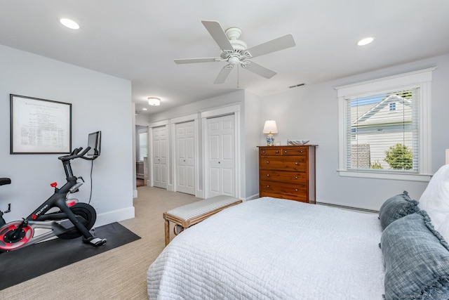 10 Fairfield Ave, Darien, CT 06820 - carpeted bedroom with recessed lighting, two closets, baseboards, ceiling fan, and a baseboard heating unit
